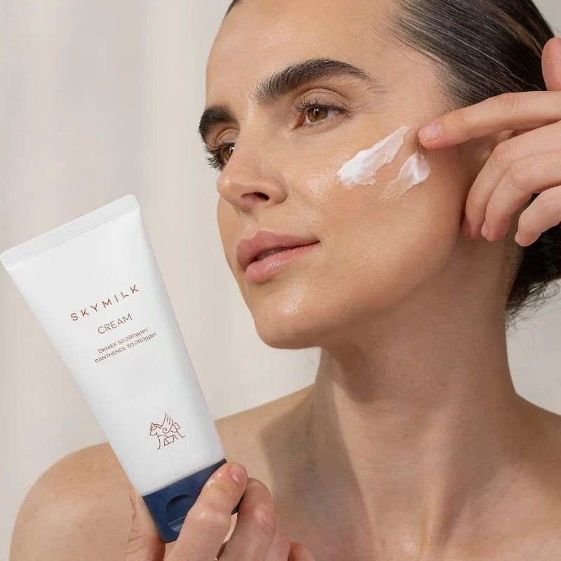 Applying SKYMILK Cream to the cheek